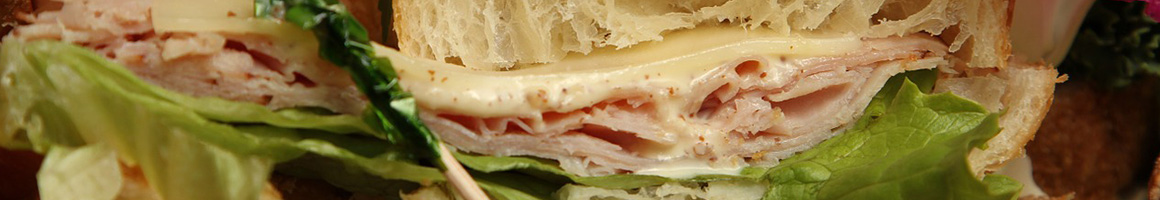 Eating Sandwich at Di Costanza Sandwich restaurant in Boothwyn, PA.